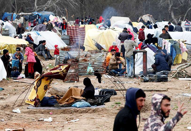 PHOTO/REUTERS:Campamento de refugiados en el cruce fronterizo de Pazarkule en Turquía con las Kastanies de Grecia, cerca de Edirne en Turquía 
