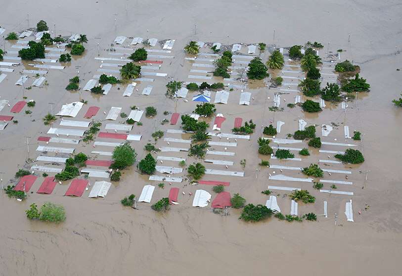 AFP/ORLANDO SIERRA:Aerial view of an area around San Pedro Sula, 240 km north of Tegucigalpa, flooded by the overflow of the Chamelecón River after Hurricane Iota