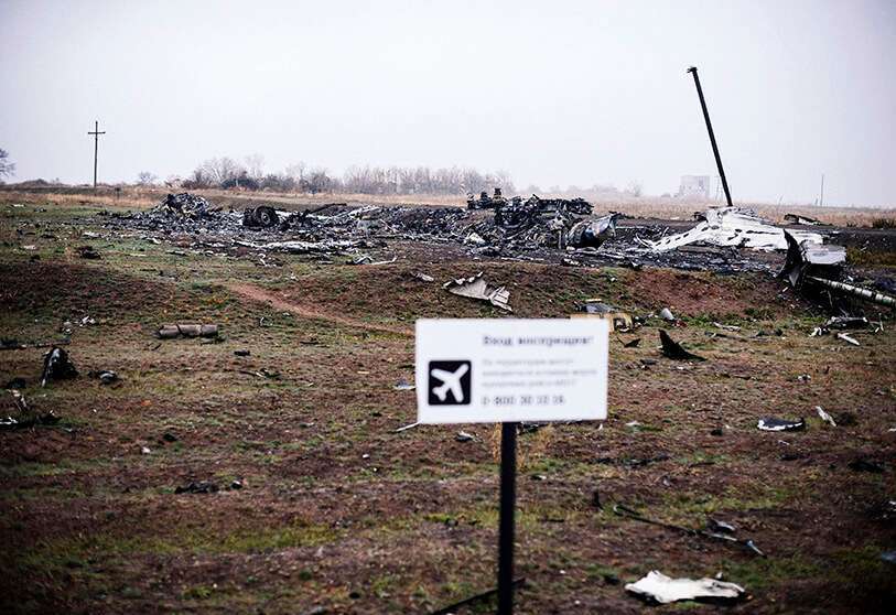 Una foto de archivo tomada el 7 de noviembre de 2014 muestra partes del vuelo MH17 de Malaysia Airlines en el lugar del accidente en el pueblo de Hrabove (Grabovo), a unos 80 km al este de Donetsk