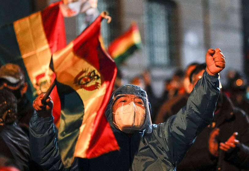 Un partidario de la ex presidenta interina de Bolivia Jeanine Áñez grita consignas contra el gobierno de Luis Arce durante una protesta en La Paz, Bolivia, el lunes 15 de marzo de 2021 AP/JUAN KARITA