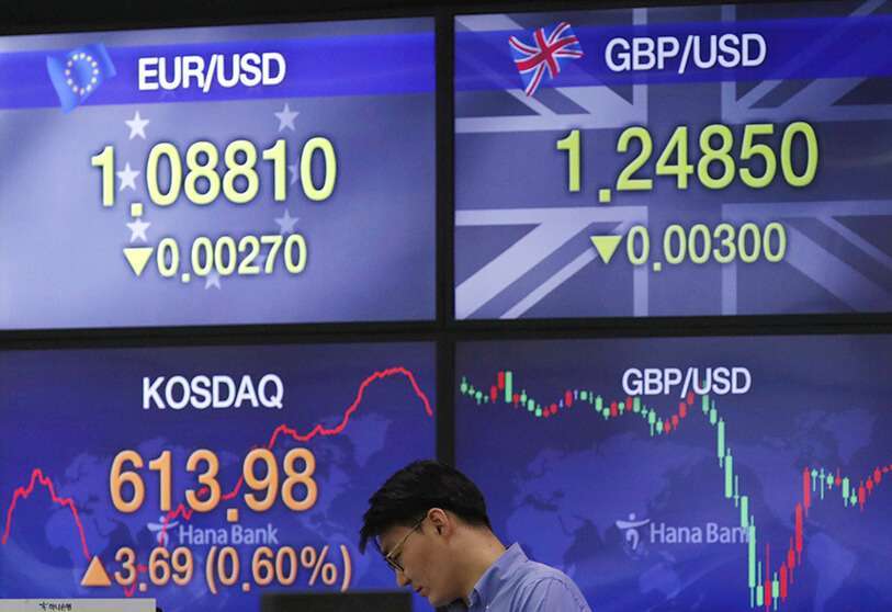 Screenshots showing exchange rates in the currency trading room in Seoul, South Korea on April 16, 2020