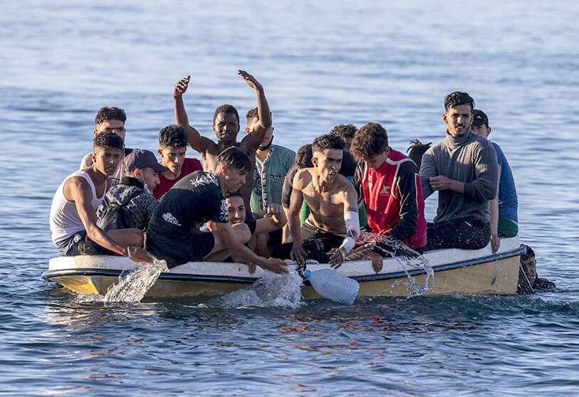 Migrants arrive in the Spanish enclave of Ceuta, near the border of Morocco and Spain, Wednesday, May 19, 2021. AP/BERNAT ARMANGUE