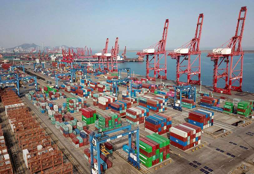 Contenedores de transporte para la exportación apilados en un puerto en Lianyungang, en la provincia oriental china de Jiangsu, el 7 de marzo de 2021, ya que el crecimiento de las exportaciones del país saltó al más alto en más de dos décadas, según datos oficiales mostrados el 7 de marzo