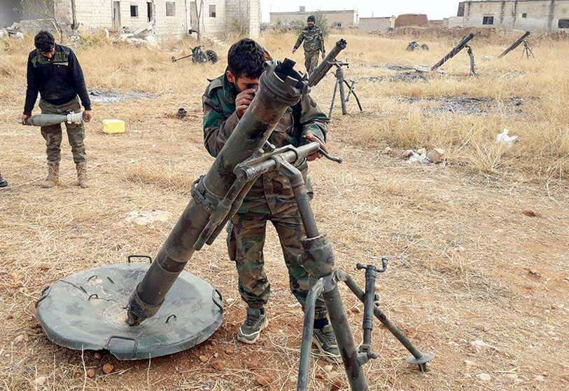 En una foto publicada por la Agencia Oficial de Noticias Árabes Sirias (SANA) el 25 de noviembre de 2019, se ven soldados del Ejército sirio en el sur del país Idlib después de haber recapturado la zona
