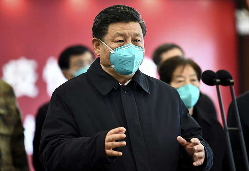PHOTO/XIE HUANCHI/XINHUA via AP - China's President Xi Jinping speaks by video with patients and medical workers at Huoshenshan Hospital in Wuhan, Hubei Province.