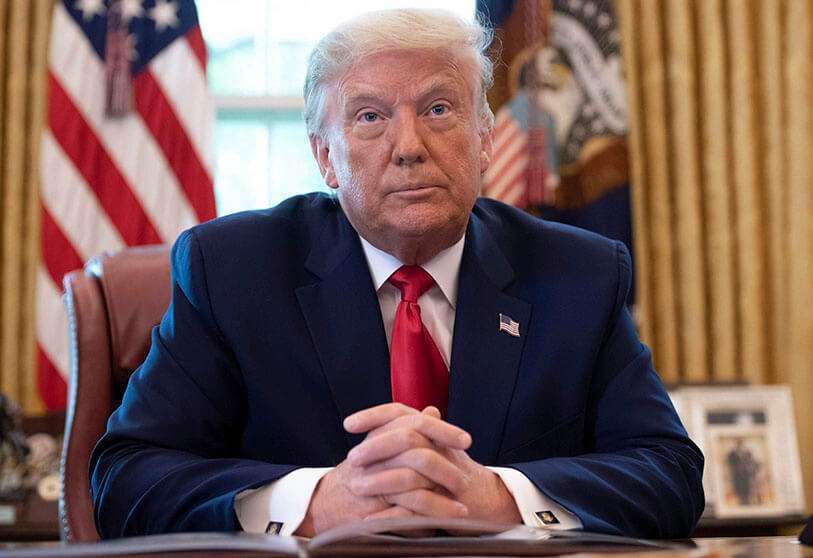 AFP/ SAUL LOEB : le président américain Donald Trump dans le bureau ovale de la Maison Blanche à Washington