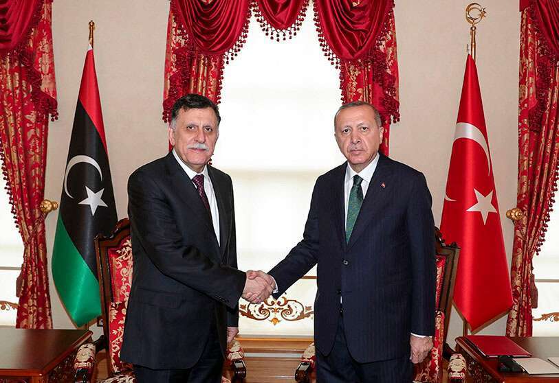 El presidente de Turquía, Recep Tayyip Erdogan, y el jefe del Gobierno de Libia de Acuerdo Nacional (GNA), Fayez Sarraj, en Estambul, el 12 de enero de 2020