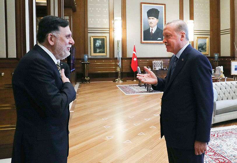 PHOTO/PRESIDENCIA TURCA - El presidente de Turquía, Recep Tayyip Erdogan, recibe al primer ministro del GNA libio, Fayez Sarraj, en Ankara, el 4 de junio de 2020