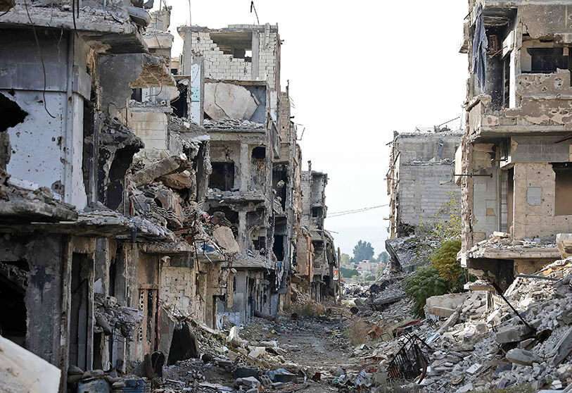 Edificios destruidos aparecen en el campamento palestino de Yarmuk, en las afueras meridionales de la capital siria, Damasco, el 25 de noviembre de 2020
