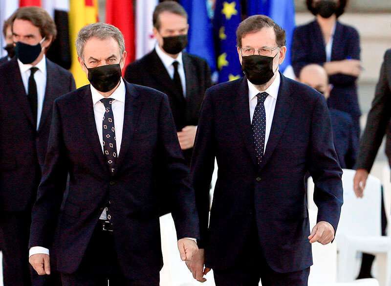 Los expresidentes del Gobierno español José Luis Rodríguez Zapatero y Mariano Rajoy