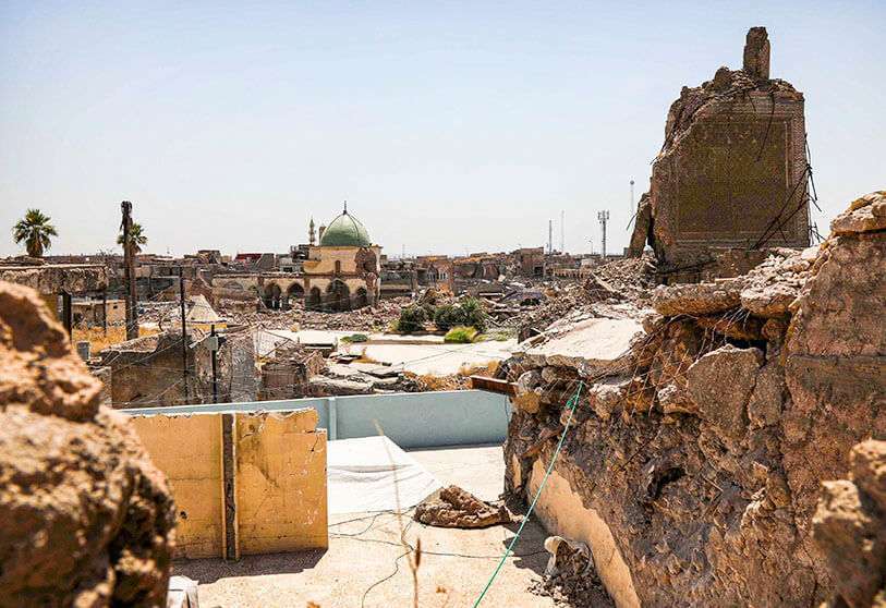 Esta fotografía tomada el 10 de agosto de 2019 muestra una vista del lugar dañado de la Gran Mezquita de Al-Nuri en Mosul, devastada por la guerra en Irak, y la base del minarete inclinado Al-Hadba destruido
