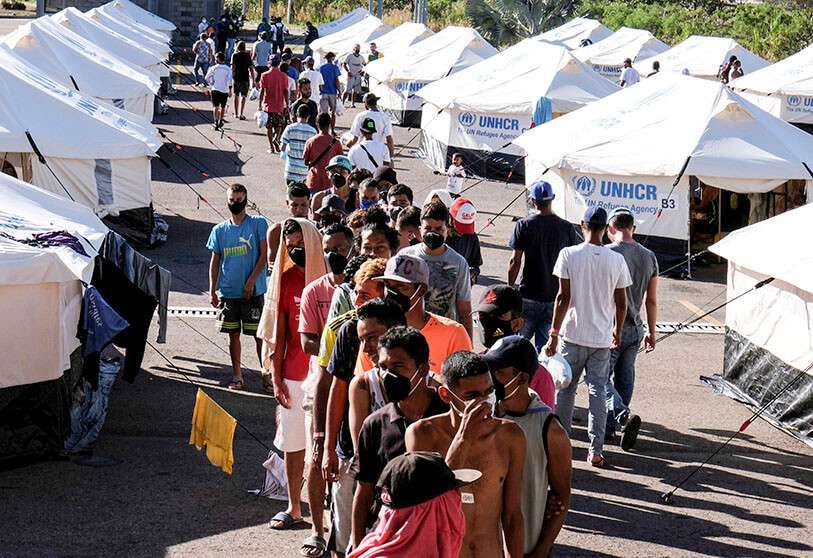 Migrantes venezolanos hacen cola en un centro de salud en la frontera entre Colombia y Venezuela, mientras esperan regresar a Venezuela, en medio del brote de la enfermedad coronavirus (COVID-19), en Cúcuta, Colombia, el 16 de junio de 2020