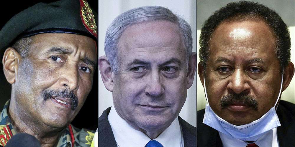 PHOTO/ ASHRAF SHAZLY/SARAH SILBIGER/AFP: The President of the Transitional Council of Sudan, Abdel Fattah al-Burhan, Israeli Prime Minister Benjamin Netanyahu and the Prime Minister of Sudan, Abdullah Hamduk. 