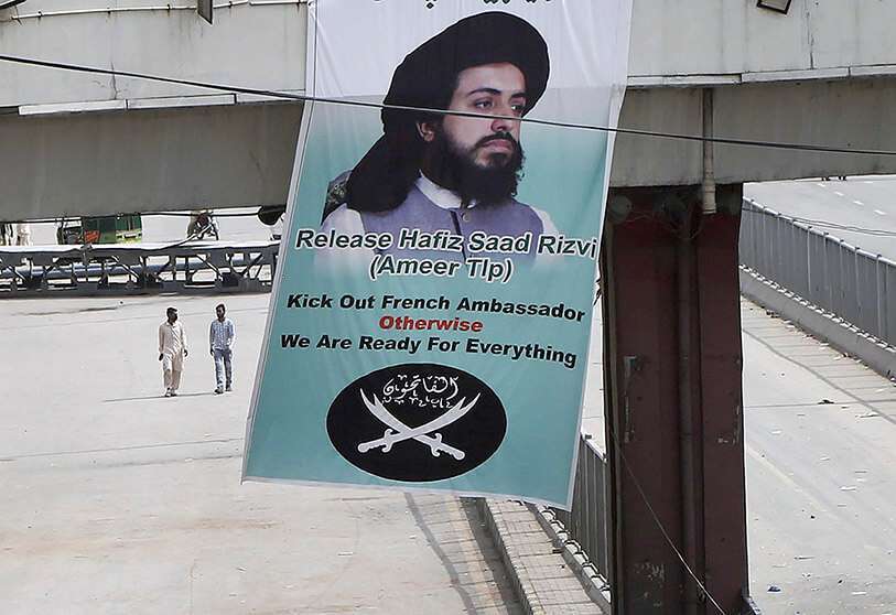 Una pancarta reivindicativa con el retrato de Saad Rizvi, líder de Tehreek-e-Labiak Pakistan, AP/K.M. CHAUDARY