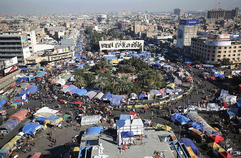 Manifestantes iraquíes se reúnen en la plaza Tahrir de la capital, Bagdad, el 20 de diciembre de 2019 durante las continuas protestas contra el Gobierno