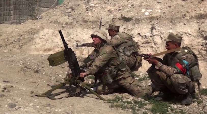 AFP / AZERBAIJAN MINISTRY OF DEFENCE - Azeri troops carrying out a combat operation during the clashes on 28 September 2020 between Armenian separatists and Azerbaijan in the border region of Nagorno-Karabakh