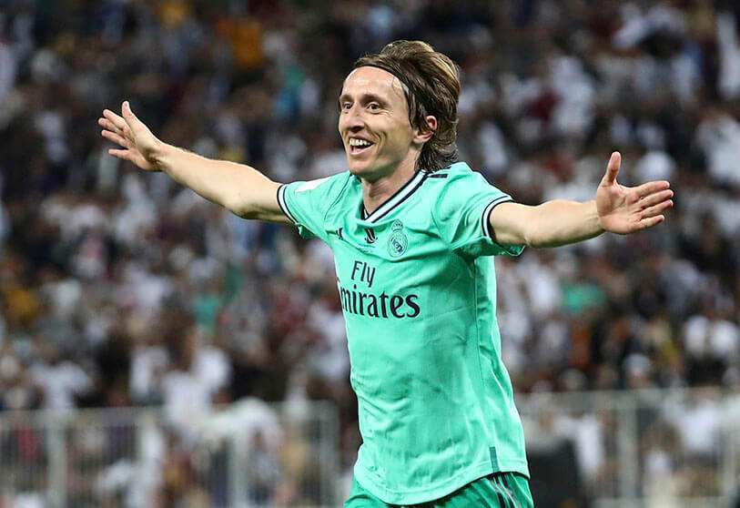 Luka Modric del Real Madrid celebra el tercer gol