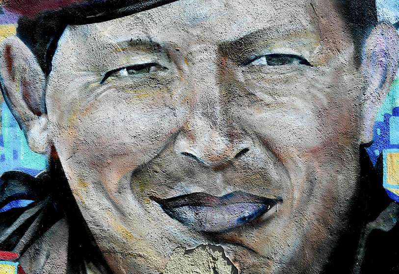 Mural que representa al difunto presidente de Venezuela Hugo Chávez en el barrio 23 de Enero de Caracas AFP/FEDERICO PARRA