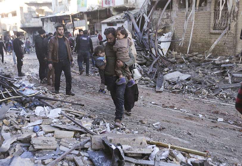 AP/GHAITH AL-SAYED - Scenes like this have been commonplace for the past nine years in Syria