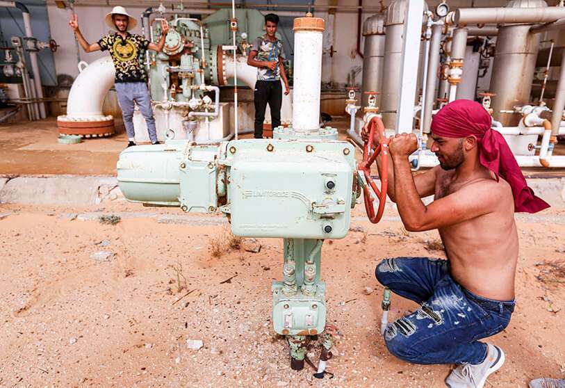 AFP/ FATHI NASRI: Tunisian demonstrators gathered inside the oil and gas plant in el-Kamour, in the southern state of Tunis