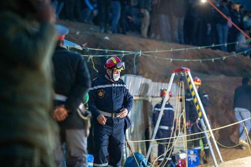 AFP - One of those responsible for rescuing the child