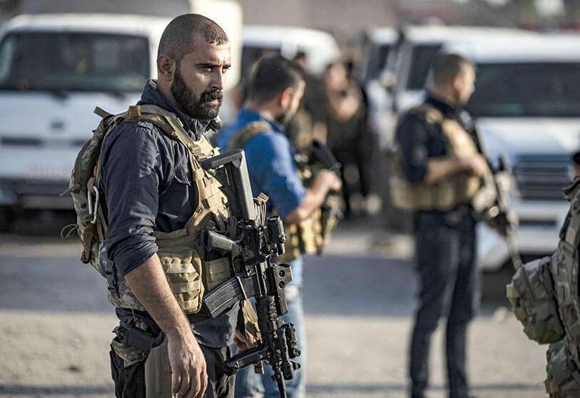 AFP/DELIL SOULEIMAN - Miembros de las fuerzas especiales de las Fuerzas Democráticas de Siria (FDS) dirigidas por los kurdos