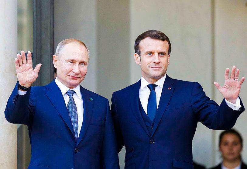 PHOTO/AP - El presidente de Francia, Emmanuel Macron, y el presidente de Rusia, Vladimir Putin, el 9 de diciembre de 2019 en París